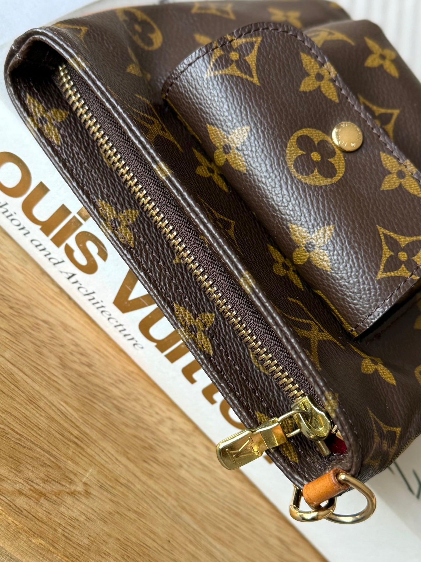 LV Partition Wristlet Pouch.