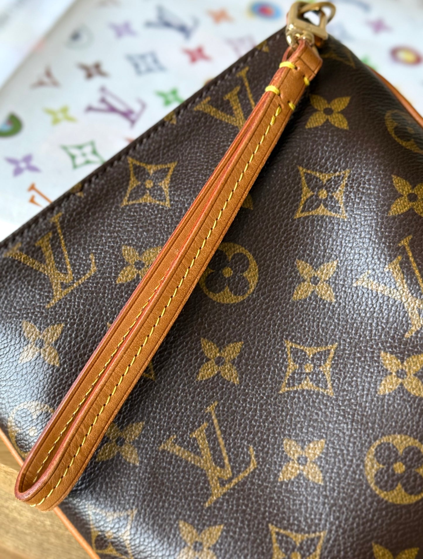 LV Partition Wristlet Pouch.