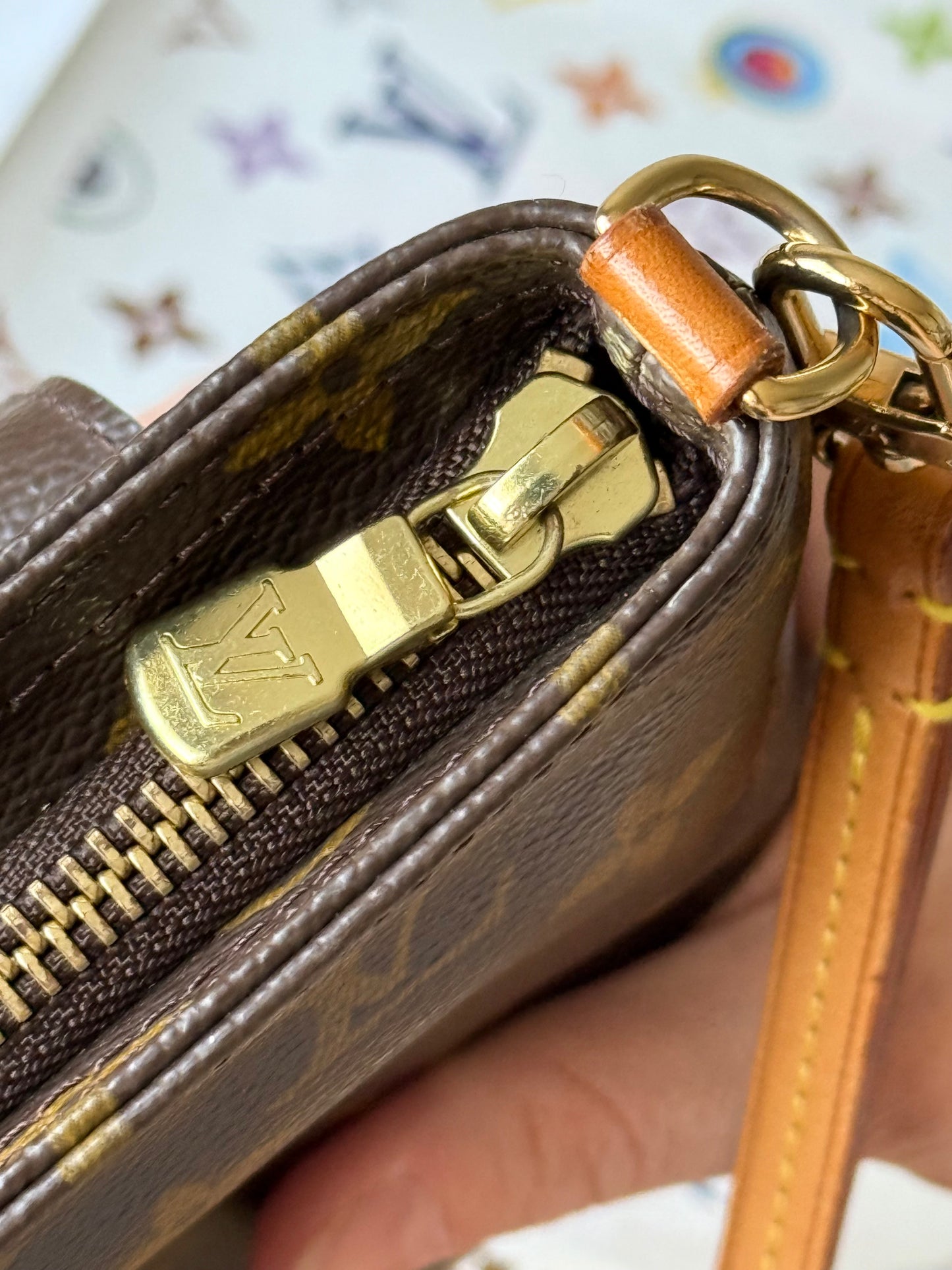 LV Partition Wristlet Pouch.