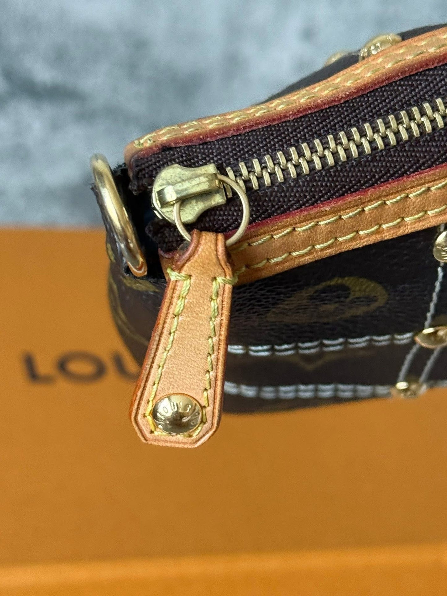 LV Rivetting Pochette Accessories