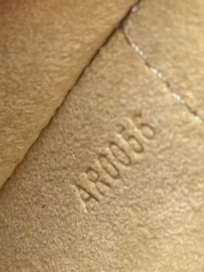 LV Tikal Pochette