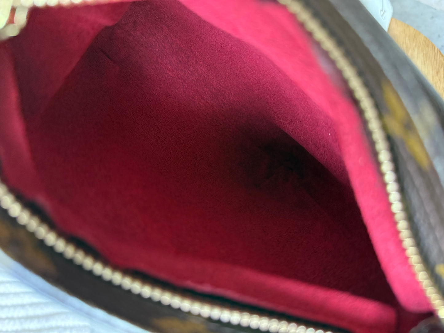 LV Partition Wristlet Pouch.