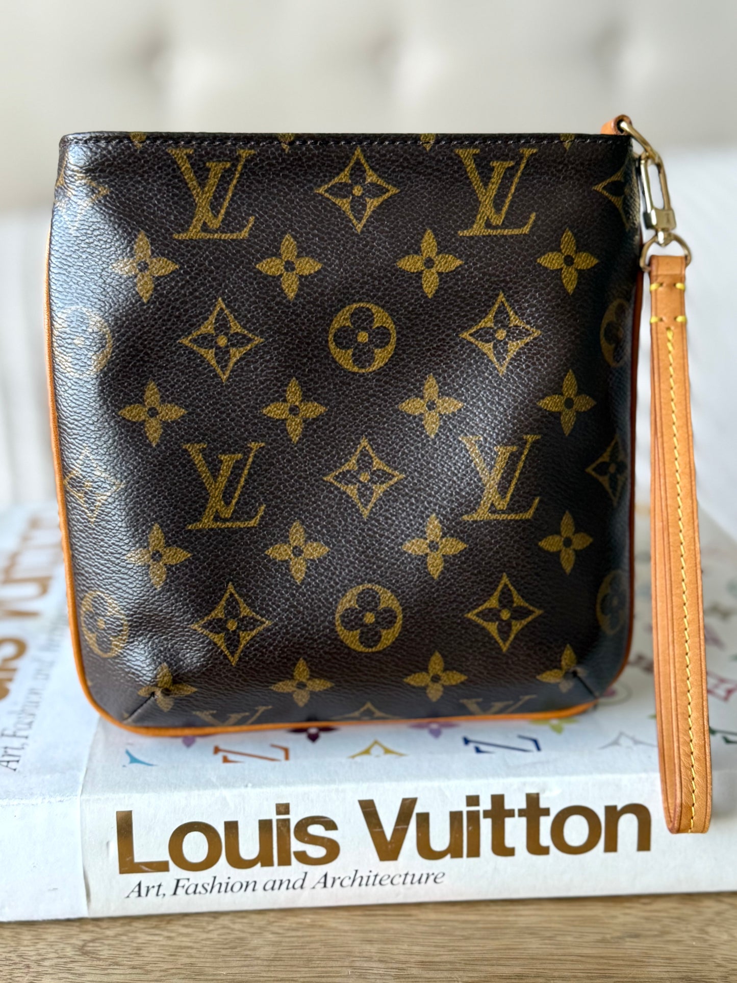 LV Partition Wristlet Pouch.