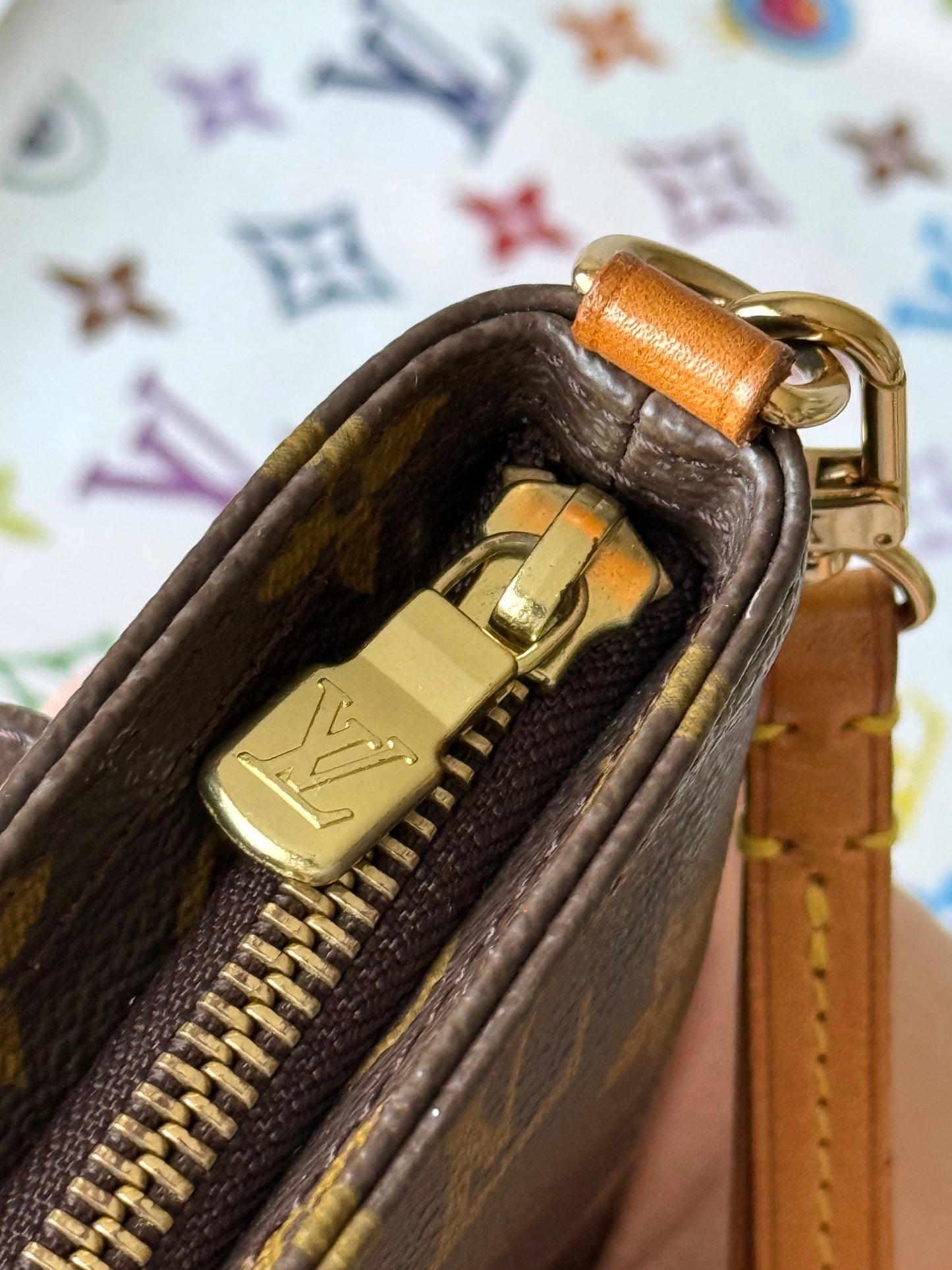 LV Partition Wristlet Pouch.