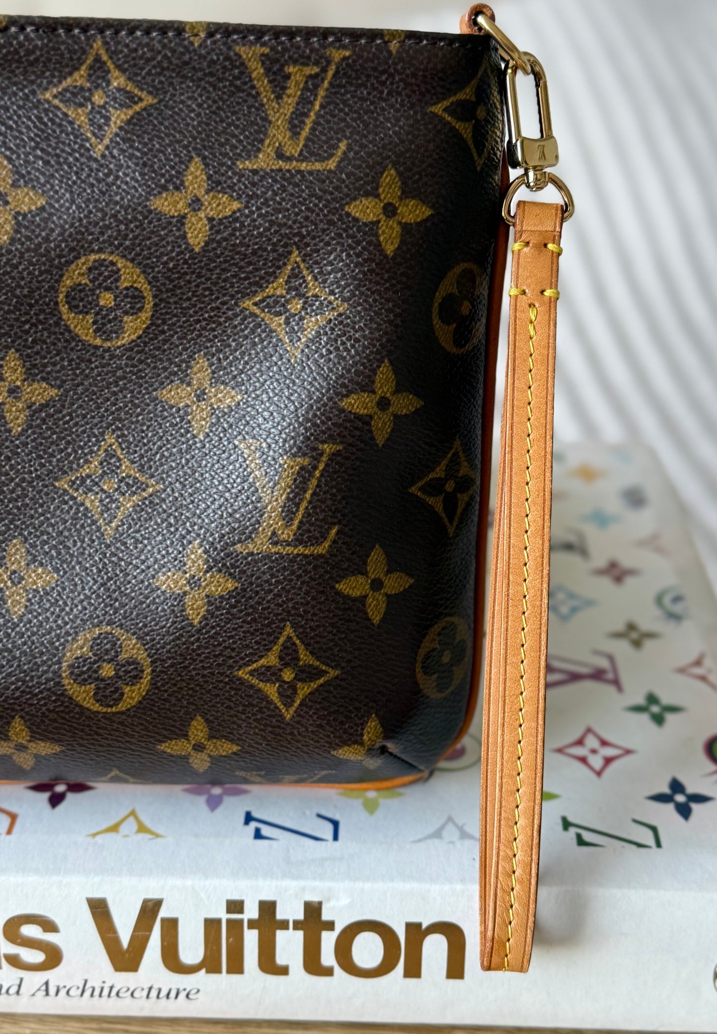 LV Partition Wristlet Pouch.