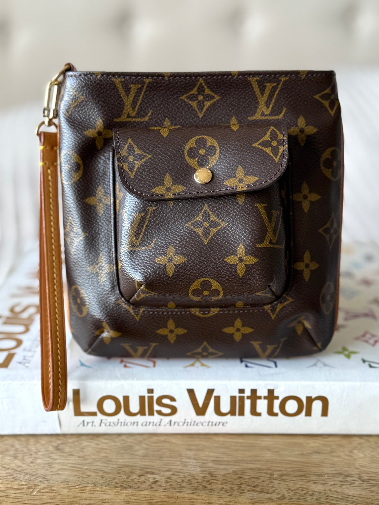 LV Partition Wristlet Pouch.