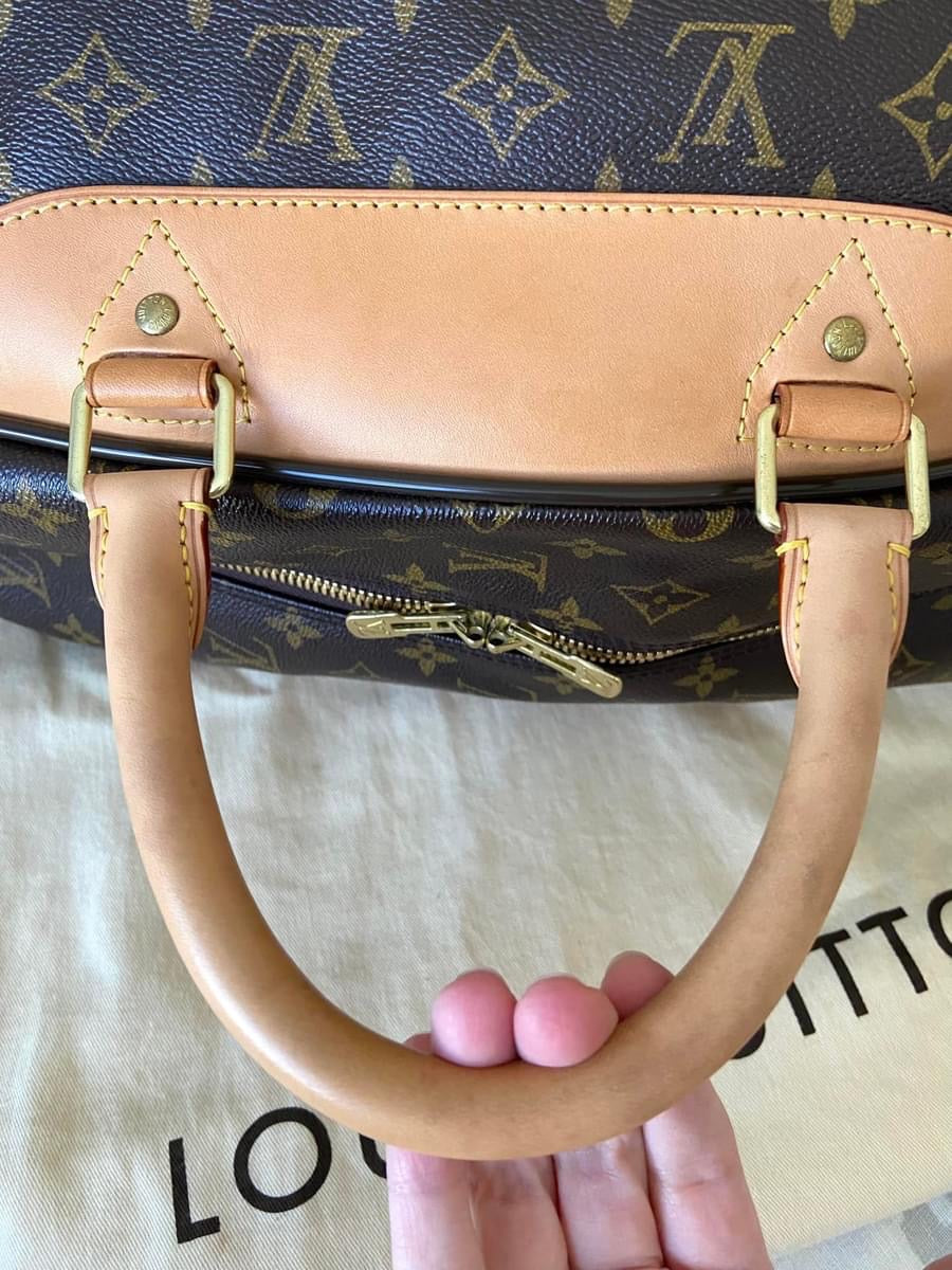 LV Eole 50 rolling luggage