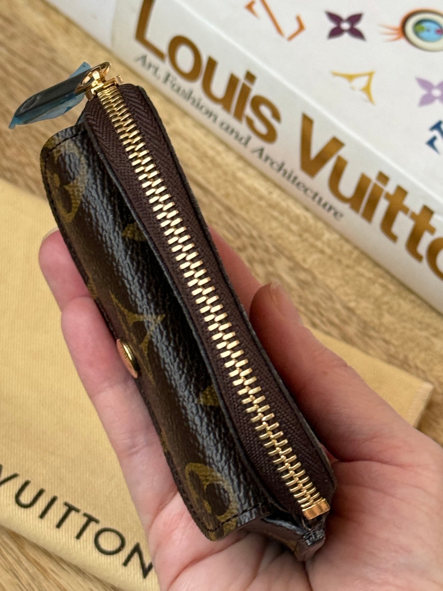 LV Schilling Coin Pouch