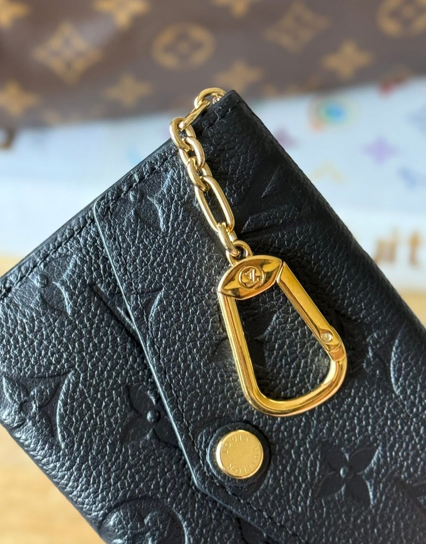 LV Key Pouch Empreinte in Noir