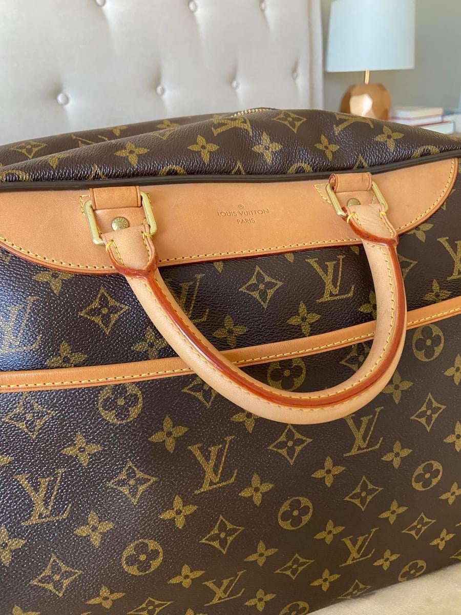 LV Eole 50 rolling luggage