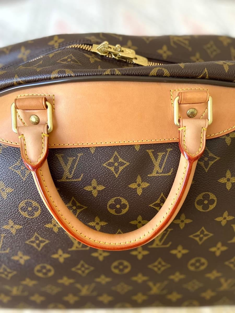LV Eole 50 rolling luggage