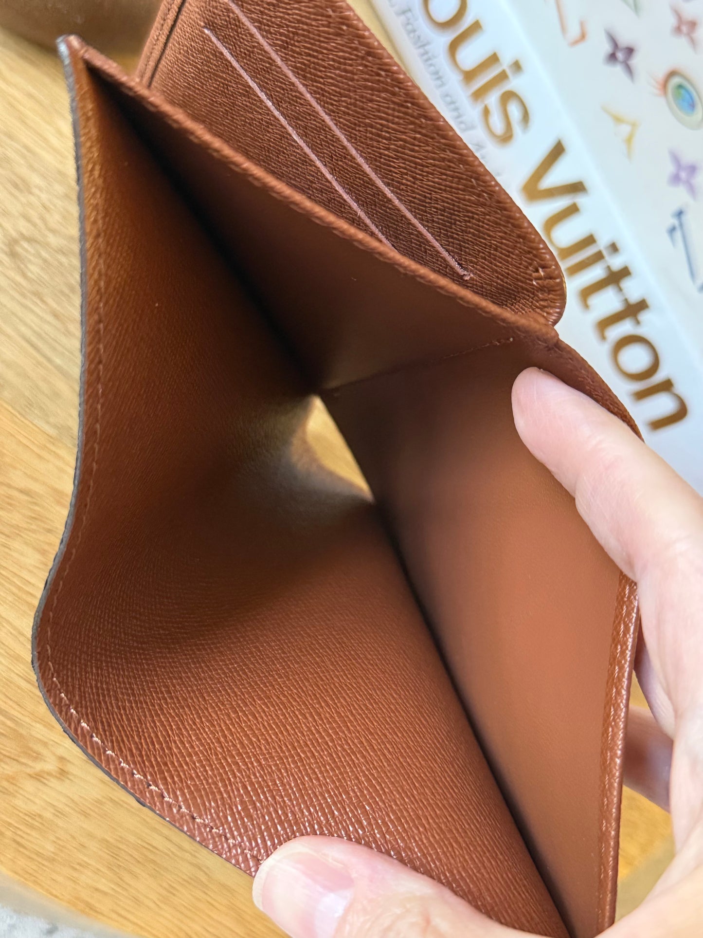 LV Trifold monogram wallet