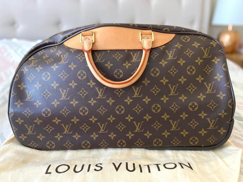 LV Eole 50 rolling luggage
