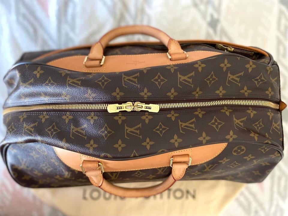 LV Eole 50 rolling luggage