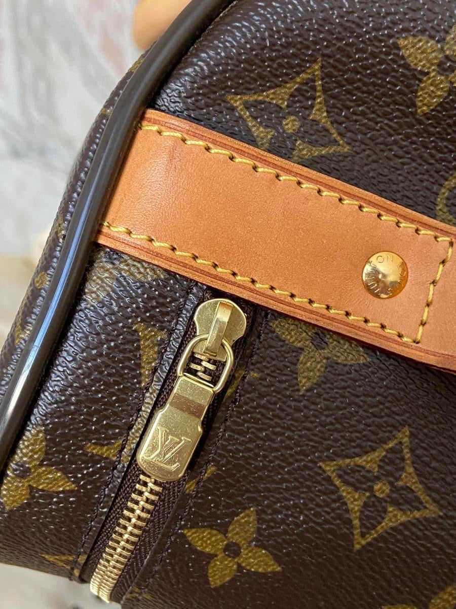 LV Eole 50 rolling luggage