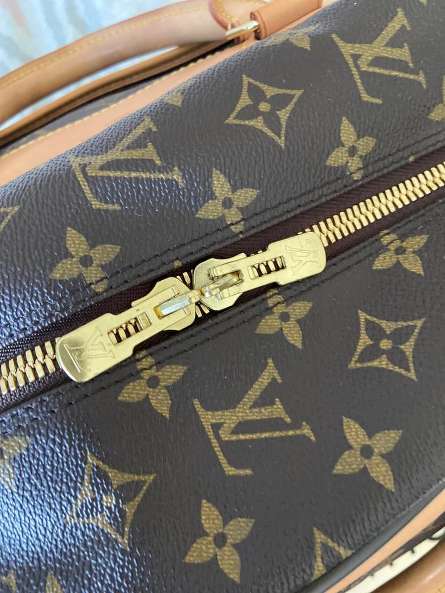 LV Eole 50 rolling luggage