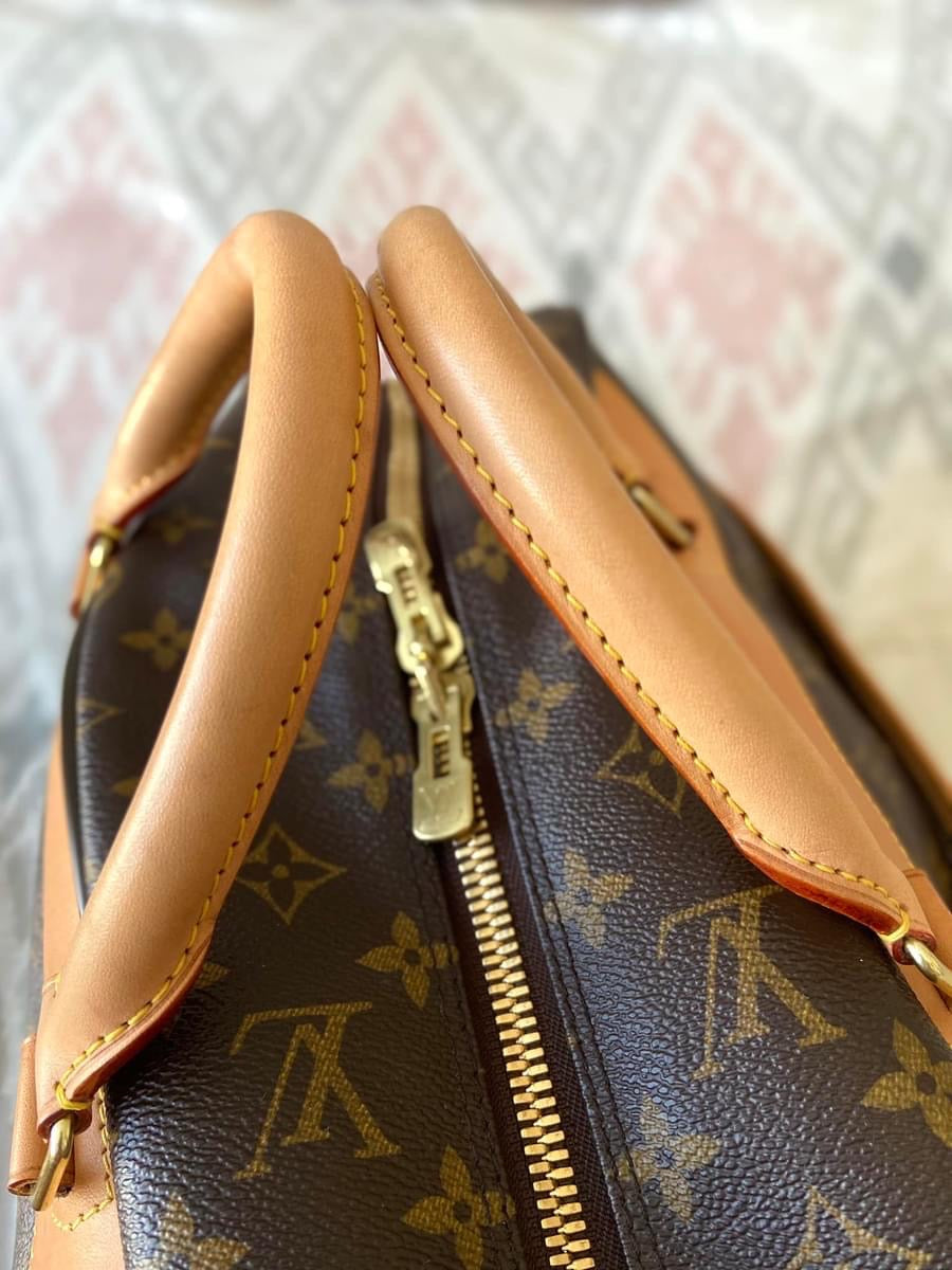 LV Eole 50 rolling luggage