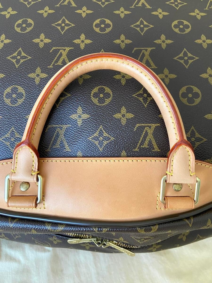 LV Eole 50 rolling luggage