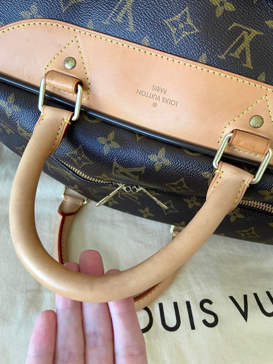 LV Eole 50 rolling luggage