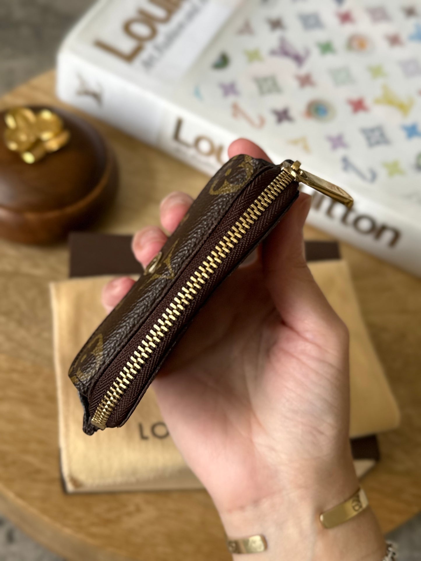 LV Schilling Coin Pouch
