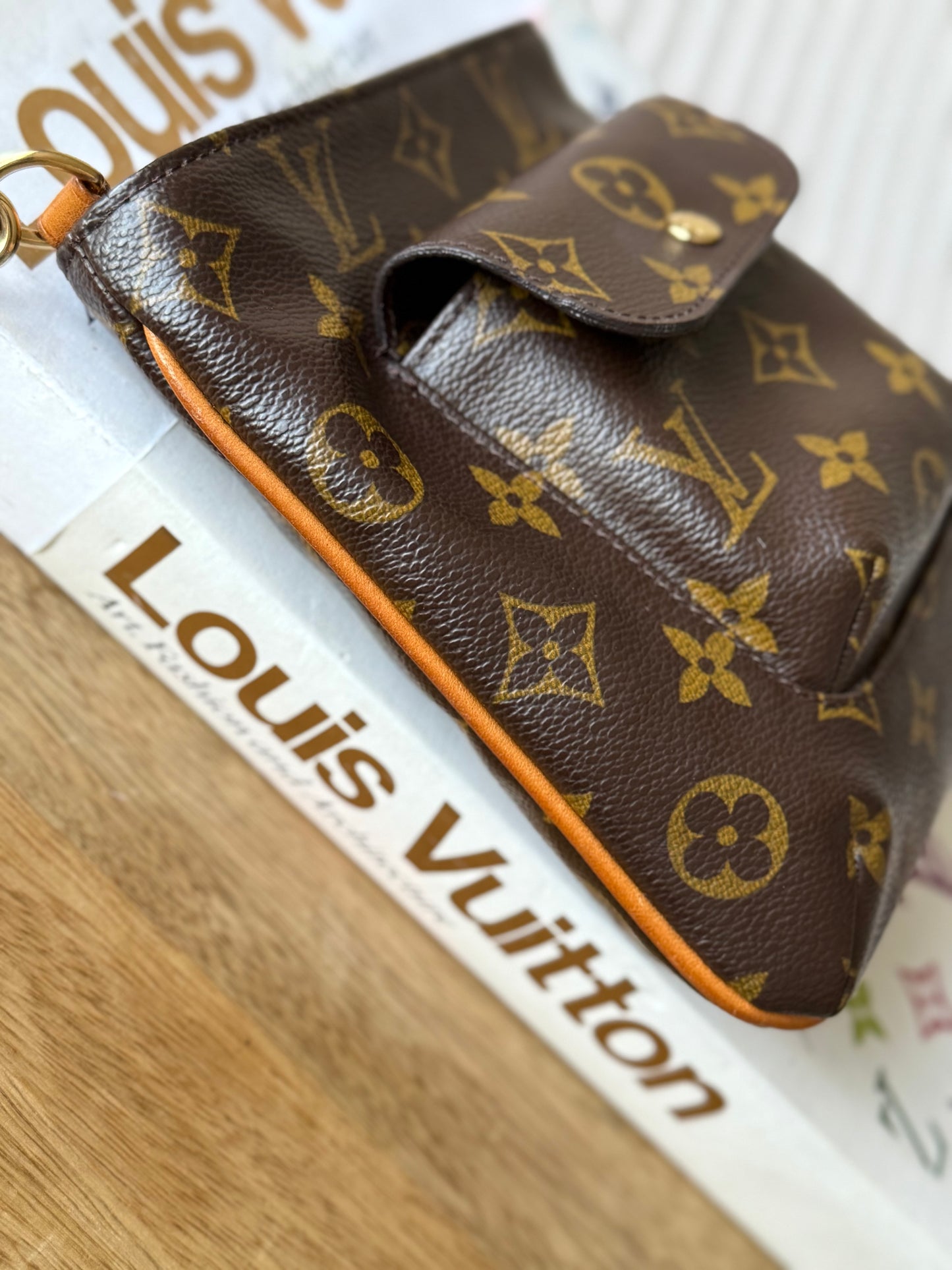 LV Partition Wristlet Pouch.