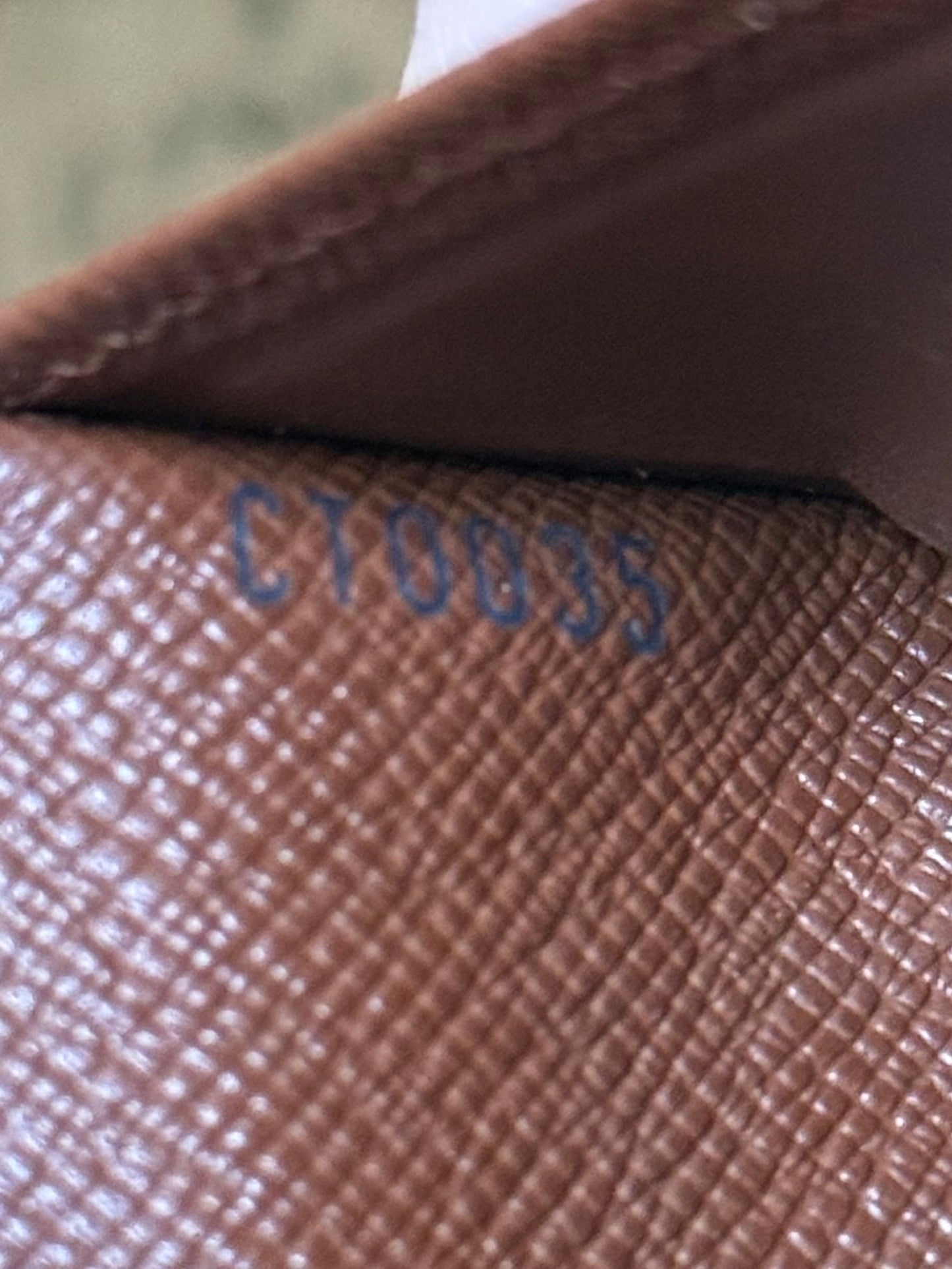 LV Trifold monogram wallet